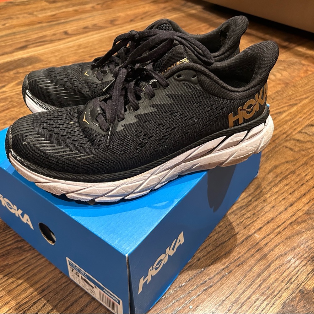 Hoka Women’s Clifton 7 Black and Bronze Athletic Shoes